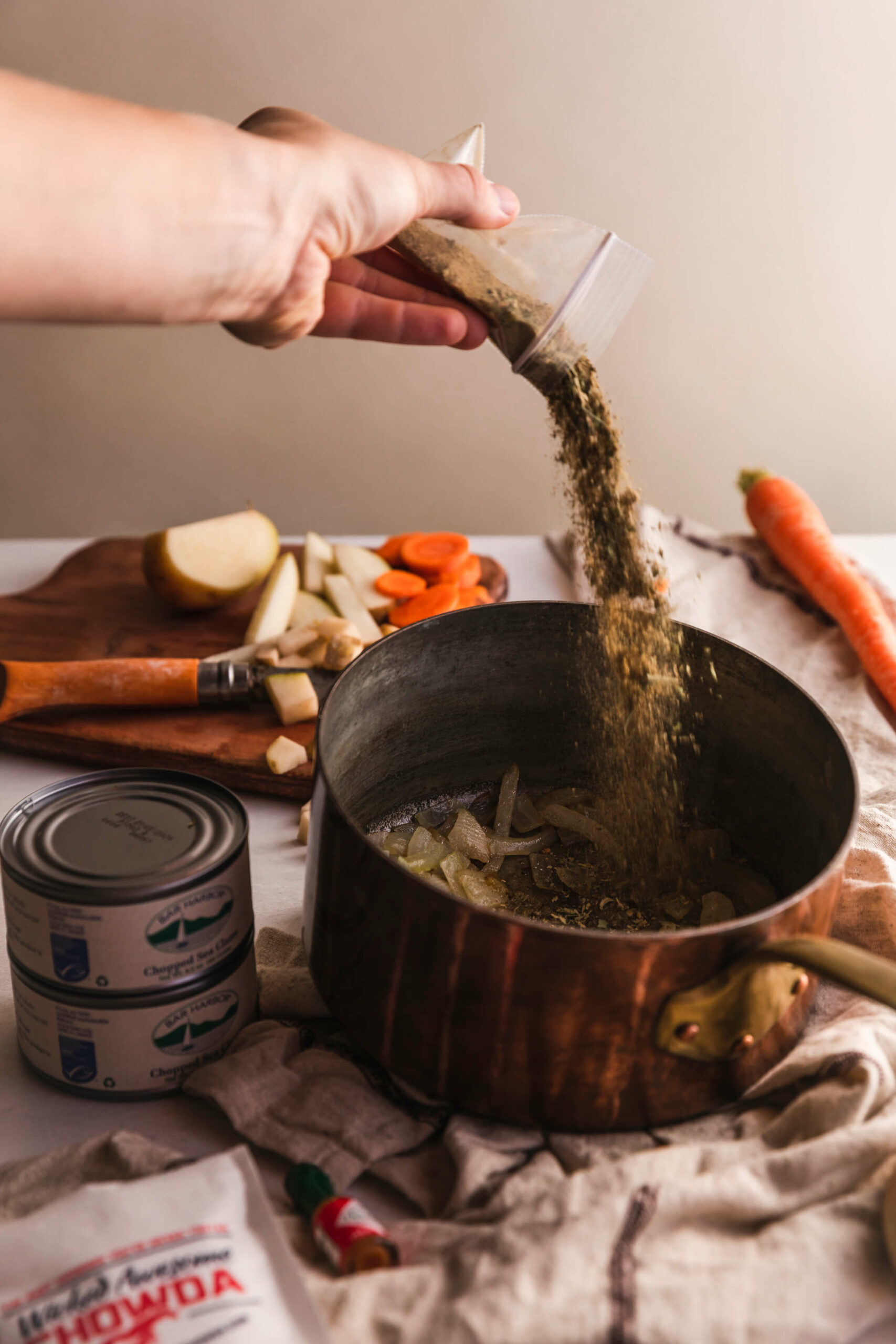 Pouring spices into a pan